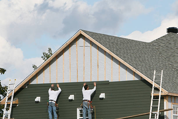 Professional Siding Repair technician working in Portland, IN
